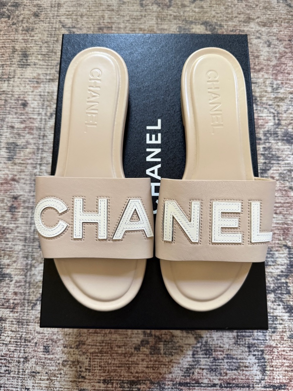 CHANEL Beige Slide Sandals with White Logo Applique